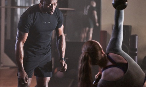 people working out in a gym area