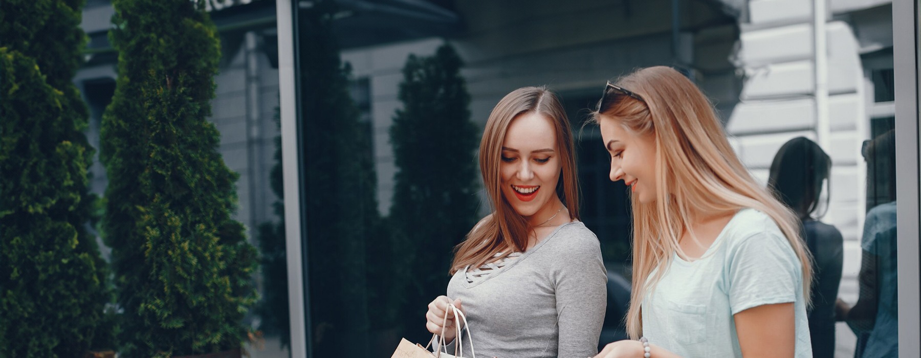 two women shopping outdoors