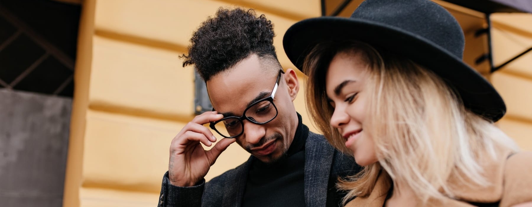 a couple outdoors in a city area